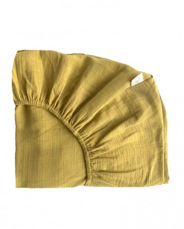 Small curry coloured fitted sheet